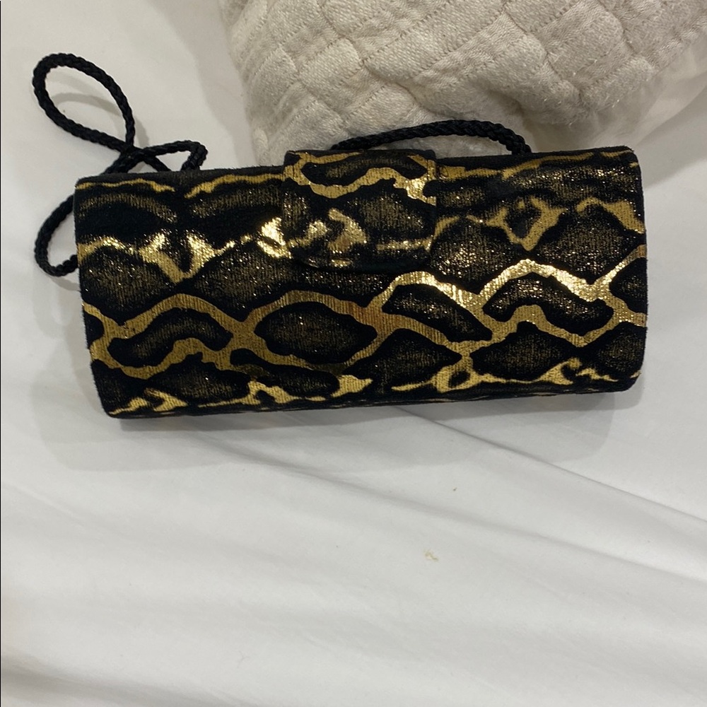 Gorgeous animal print gold and black evening clutch